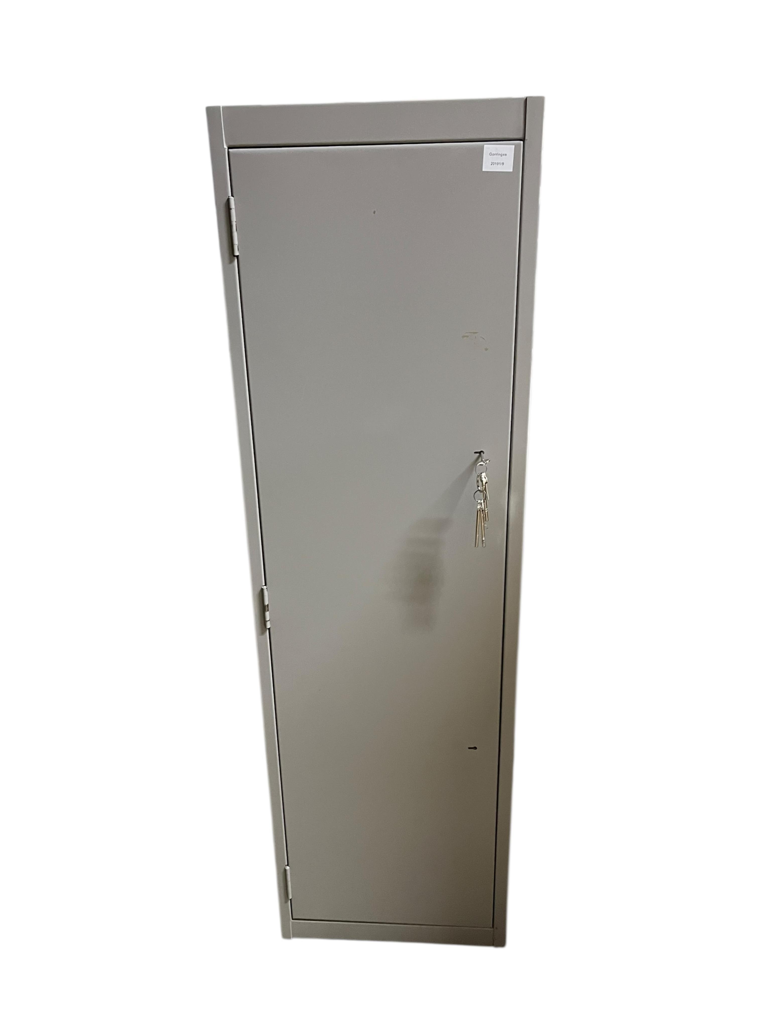 A modern steel gun cabinet with keys, width 46cm, depth 30cm, height 153cm